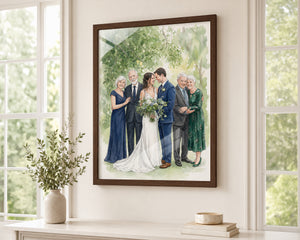 A framed custom family portrait print hanging on a cream-colored wall in a bright room. The print depicts a wedding scene with a bride and groom surrounded by their relatives, and it is enclosed in a dark brown wooden frame.