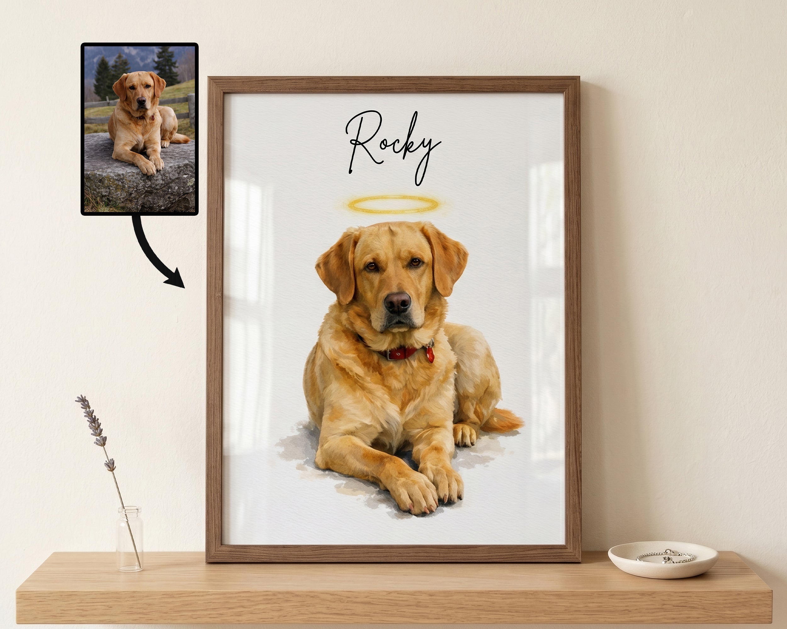 A framed custom pet portrait of a golden retriever named 'Rocky' with a gold halo and script text, displayed on a wooden shelf next to a small vase with lavender and a dish. A small inset photo of the original dog photo with an arrow points to the portrait, indicating a custom print service.